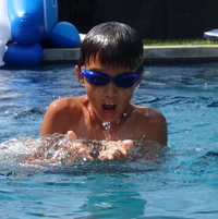 boy taking breath during breaststroke in Southampton